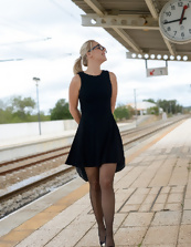 Sexy stockings mom shows shaved pussy at a railway station