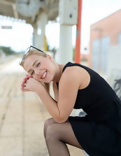 Sexy stockings mom shows shaved pussy at a railway station