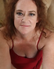 Sexy redhead mature porn pics showing teasing and such