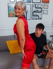 Red get-up beauty is going to enjoy sexy time with a twink