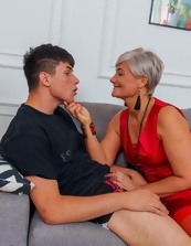 Red get-up beauty is going to enjoy sexy time with a twink