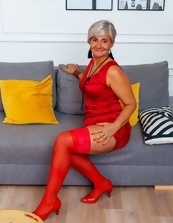 Red get-up granny showing her naked MILF pics to you