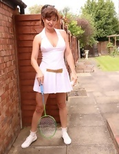 Tennis gear babe showing her ass in nude MILF pics