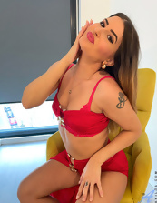 Red lingerie babe is going to tease across the photos